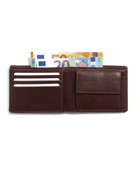 Brown leather bifold wallet open with slot and coin pocket detail on white background - MONPIEL