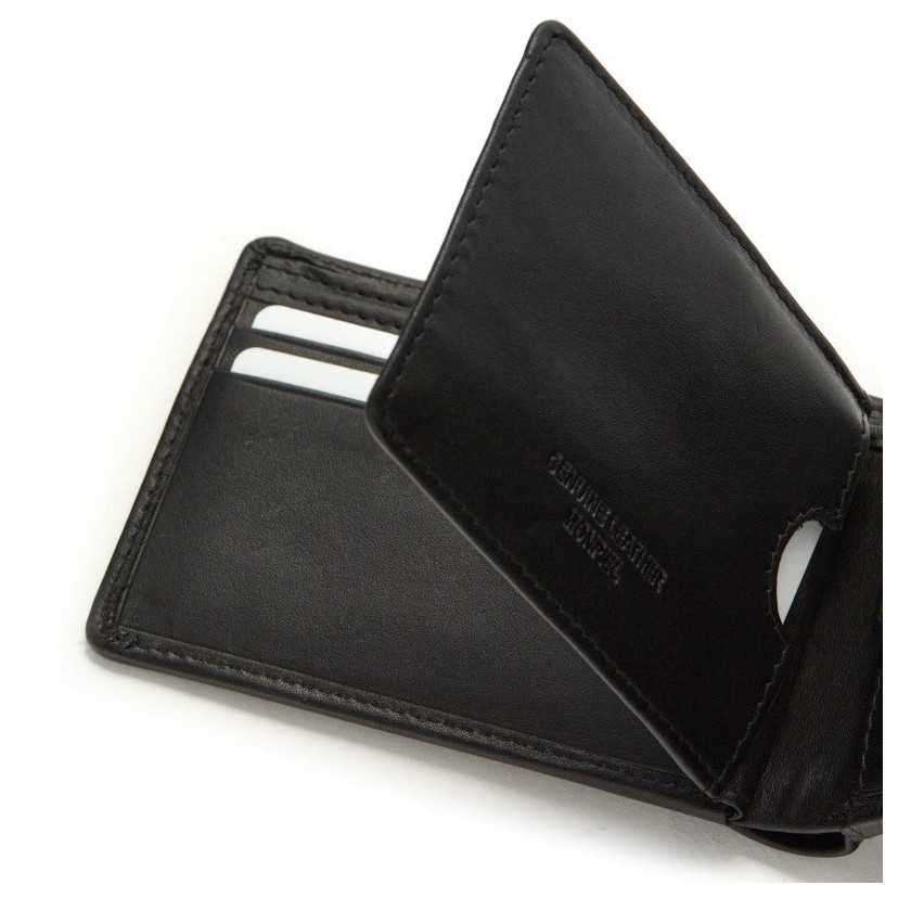 Small black leather American-style wallet, close-up detail of cards, on a white background - MONPIEL