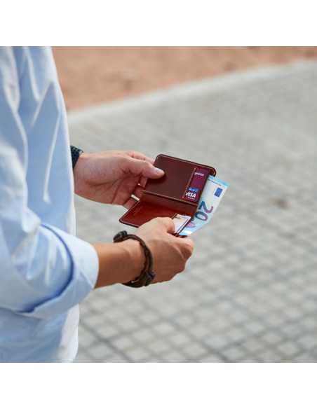Small Havana leather men’s wallet with bill compartment, outdoor photo open with size detail - MONPIEL Small Havana leather men’s wallet with bill compartment, outdoor photo open with size detail - MONPIEL