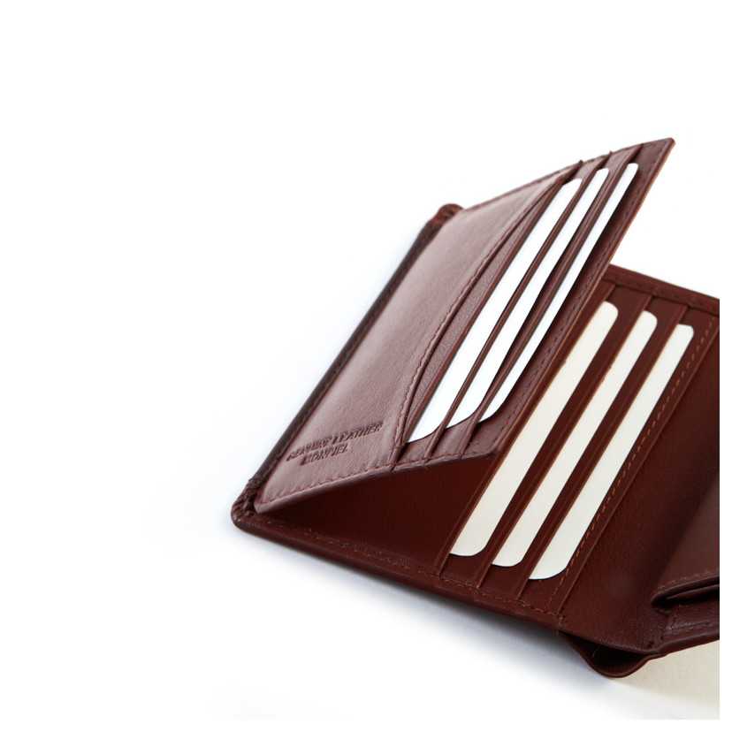 Brown leather wallet with coin pocket Lago, card slot details, on a white background - MONPIEL