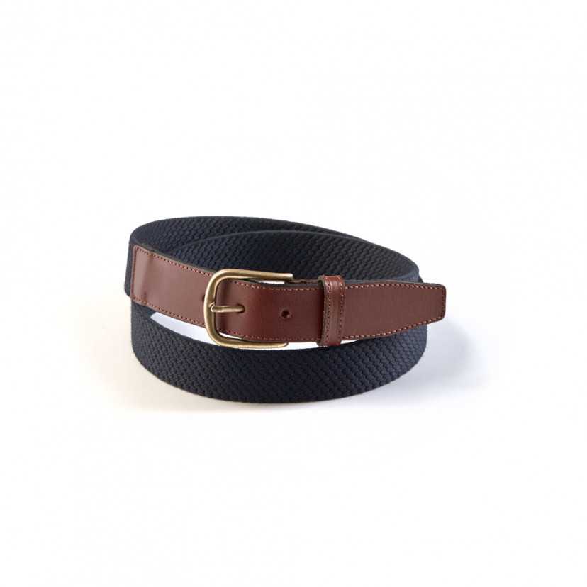 Men’s navy elastic leather belt, coiled, on a white background - MONPIEL
