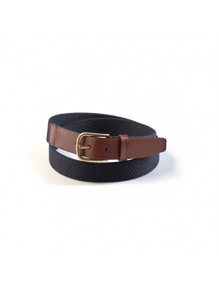 Men’s navy elastic leather belt, coiled, on a white background - MONPIEL Men’s navy elastic leather belt, coiled, on a white background - MONPIEL