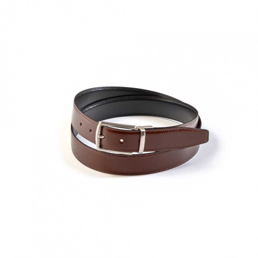 Detail of black-leather belt with metal buckle, coiled, on a white background - MONPIEL