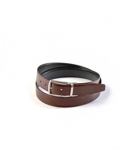 Detail of black-leather belt with metal buckle, coiled, on a white background - MONPIEL