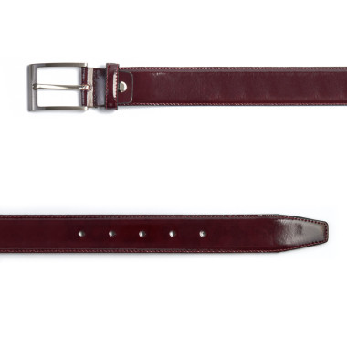 Top view of burgundy leather belt, metal buckle detail - MONPIEL 2