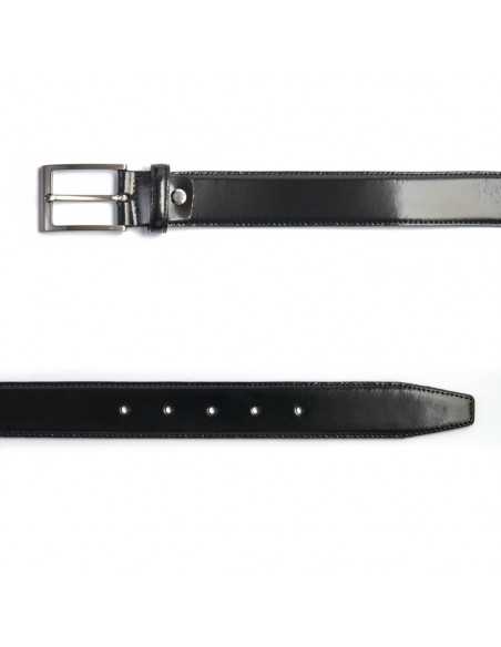 Black leather belt seen from above, showing the metal buckle detail - MONPIEL
