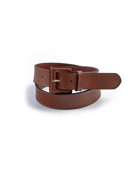 Women’s wide leather belt with a covered buckle, coiled, in tan, on a white background - MONPIEL Women’s wide leather belt with a covered buckle, coiled, in tan, on a white background - MONPIEL