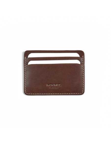 Mini leather cardholder in brown,front view,slot and logo detail on a white background - MONPIEL Mini leather cardholder in brown,front view,slot and logo detail on a white background - MONPIEL