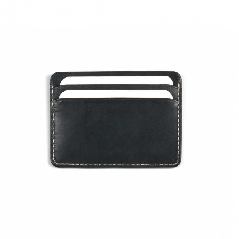 Mini leather cardholder in black, rear view with slot detail on a white background - MONPIEL