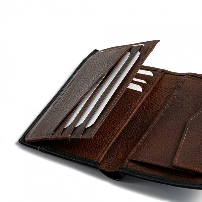 Black leather wallet with clasp and interior coin pocket, card slots detail on a white background - MONPIEL