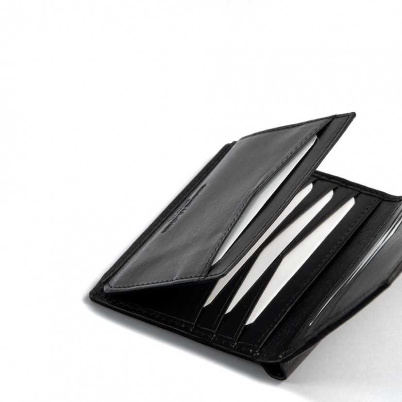 Simple wallet with central logo in black, featuring an enlarged detail of card slots, on a white background - MONPIEL