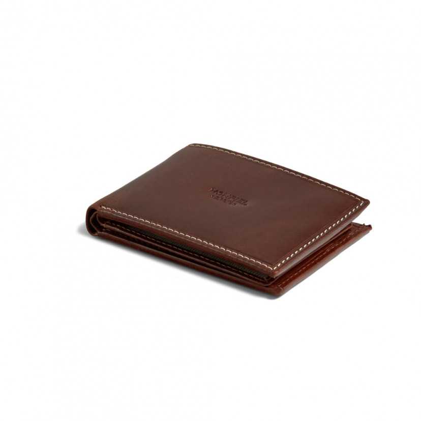 Small simple leather wallet in tan, shown in perspective on a white background - MONPIEL