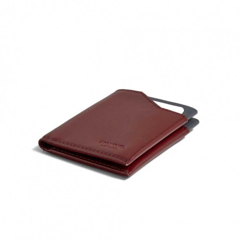 Burgundy leather pocket wallet, shown in perspective on a white background - MONPIEL