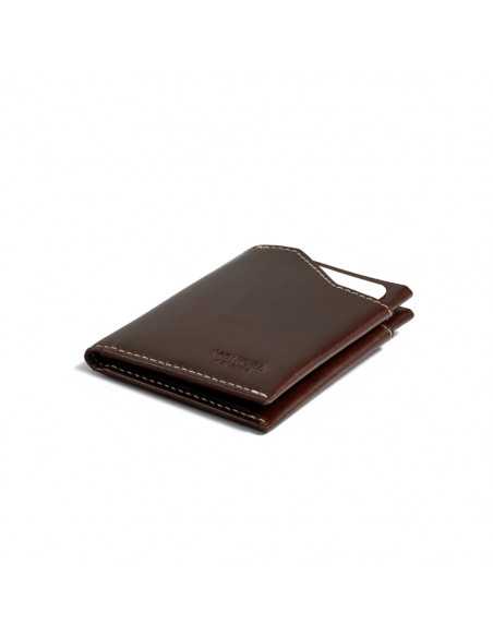 Brown leather pocket wallet, shown in perspective on a white background - MONPIEL Brown leather pocket wallet, shown in perspective on a white background - MONPIEL