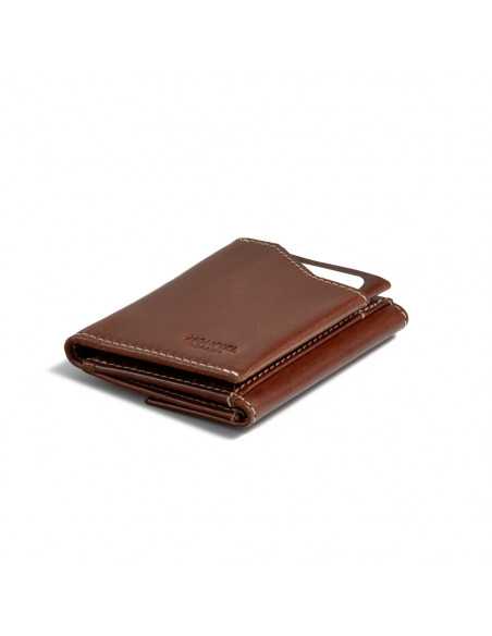 Tan leather pocket wallet with coin purse, shown in perspective on a white background - MONPIEL