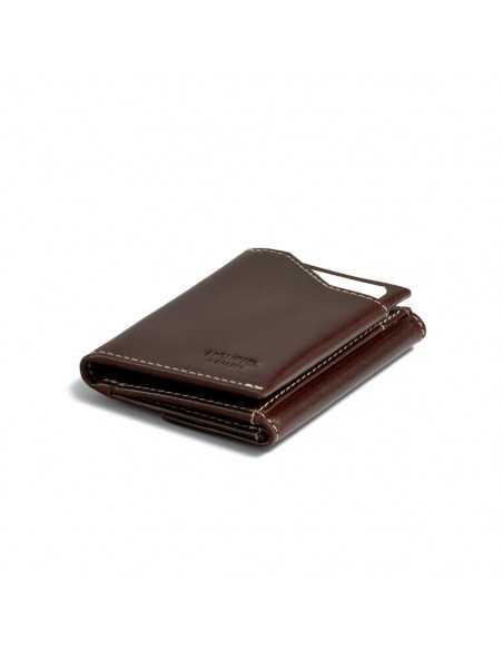 Brown leather pocket wallet with coin purse, shown in perspective on a white background - MONPIEL