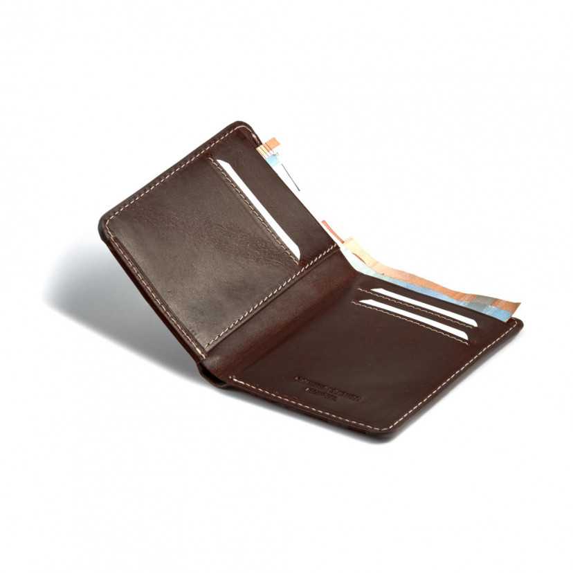 Small brown leather men's wallet with billfold, open with card slot details on a white background - MONPIEL