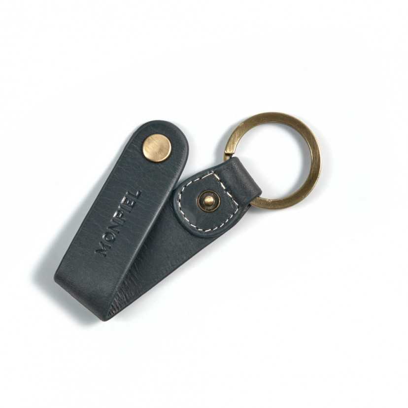 Blue leather keychain, open with button detail and inner stitching on a white background - MONPIEL