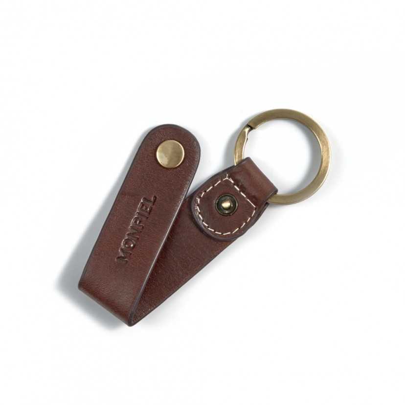 Brown unisex leather keychain, open with stitching detail and slightly tilted on a white background - MONPIEL
