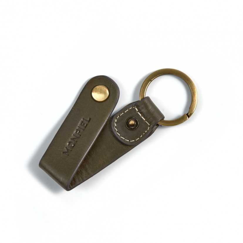 Green unisex leather keychain, open with stitching detail and slightly tilted on a white background - MONPIEL