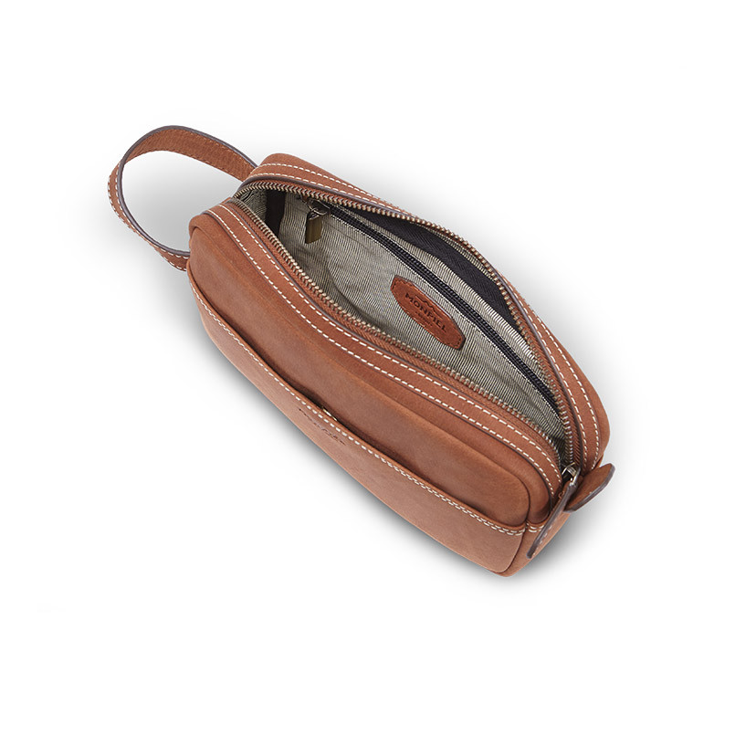 Havana leather men's toiletry bag, shown from above with open zipper and interior detail on a white background - MONPIEL