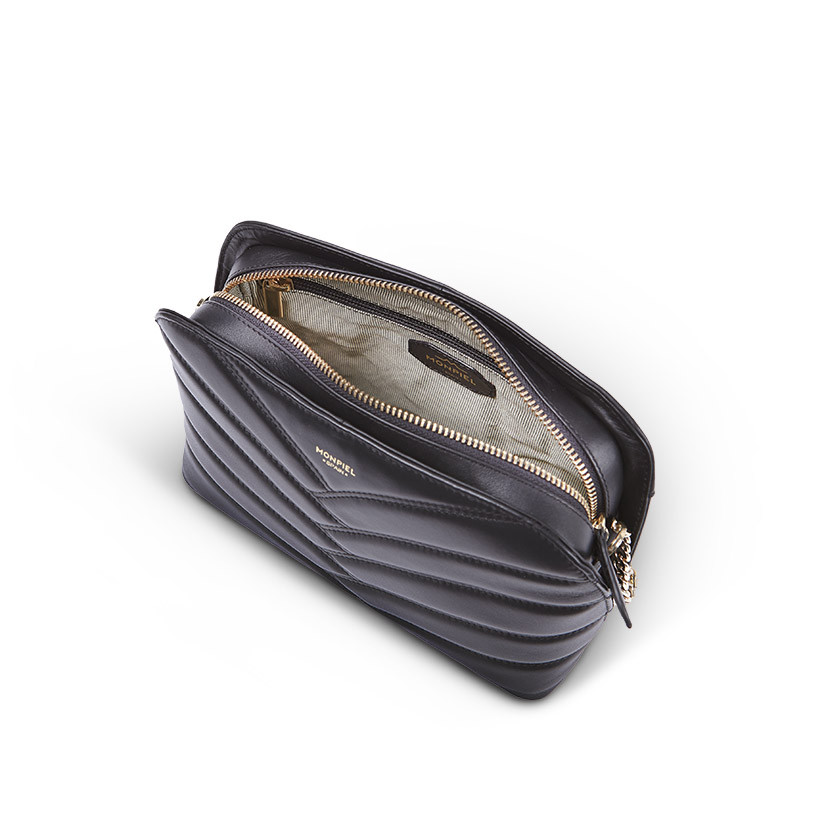 Black leather quilted bag with gold chain, open with interior detail on a white background - MONPIEL