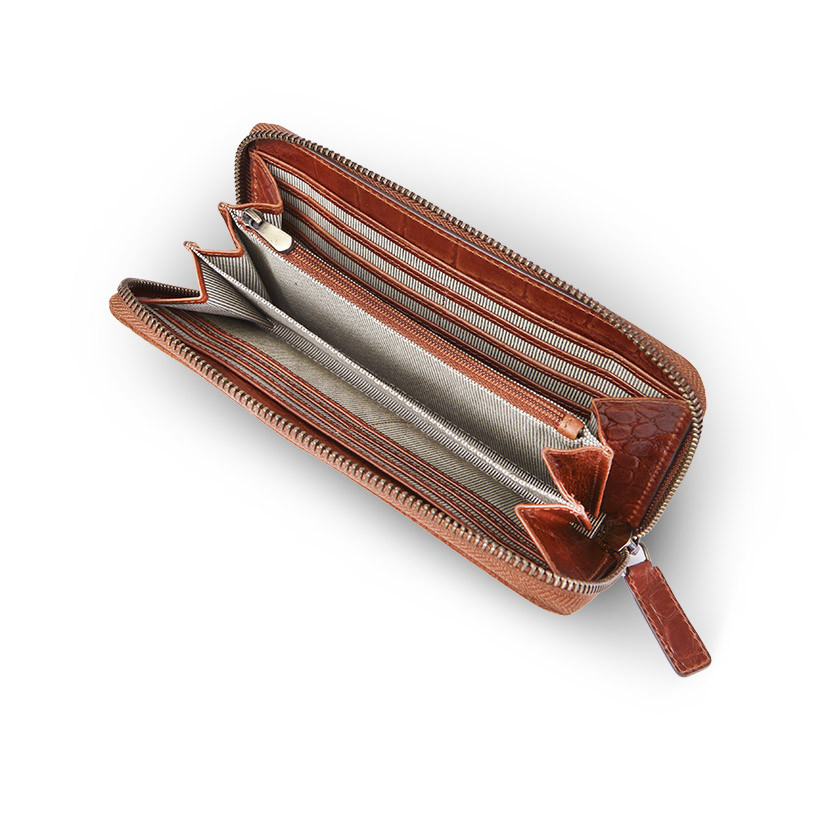 Women's leather wallet in tan, with the zipper open, interior detail on a white background - MONPIEL