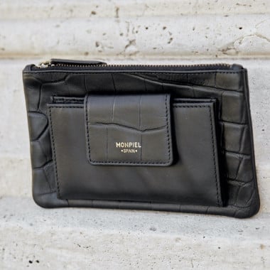 Women’s leather wallet with interior pocket in leather color, top-down perspective resting on a wooden table - MONPIEL 2