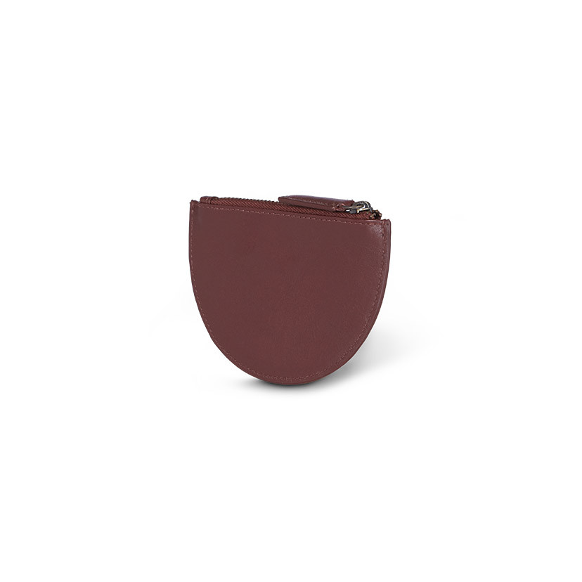 Half-moon leather coin purse in brown, shown from the back in perspective on a white background - MONPIEL