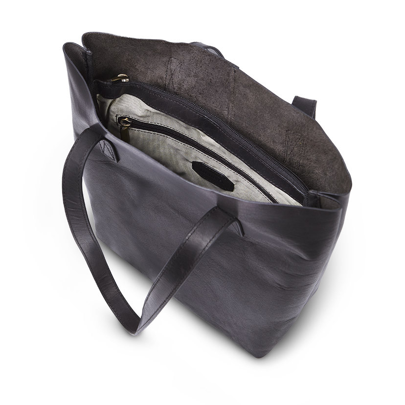 Black leather shopper bag, shown open with interior detail on a white background - MONPIEL