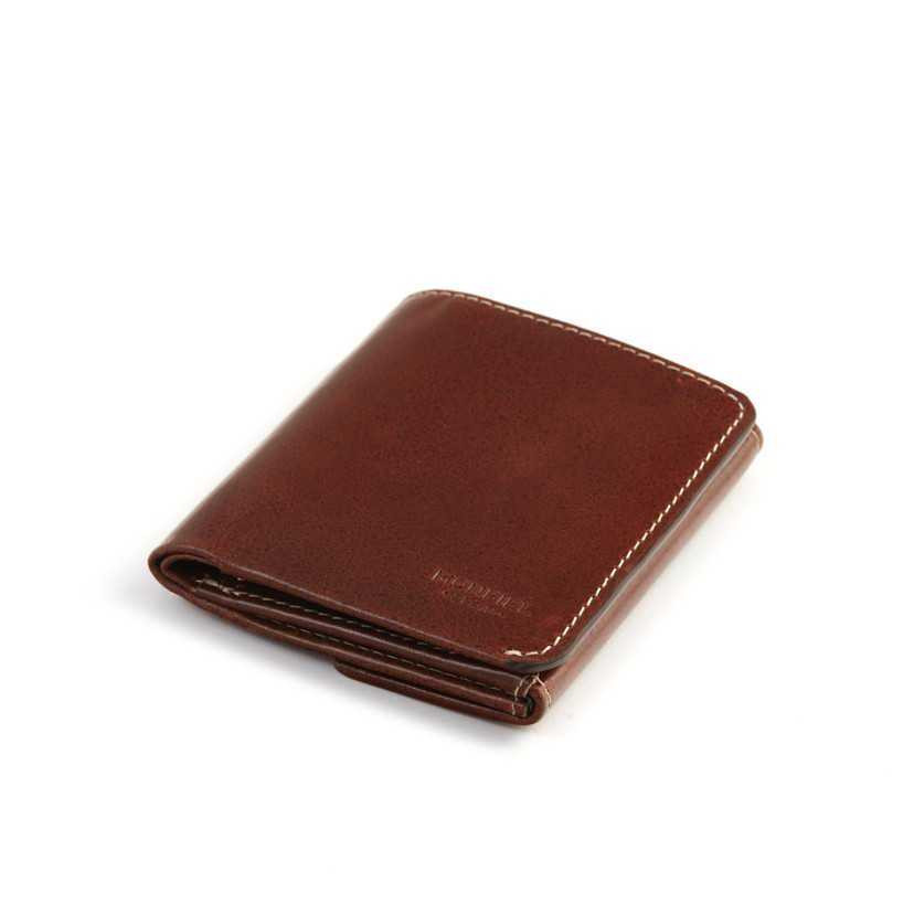 Small Havana leather men's wallet with billfold and coin purse, shown in perspective on a white background - MONPIEL