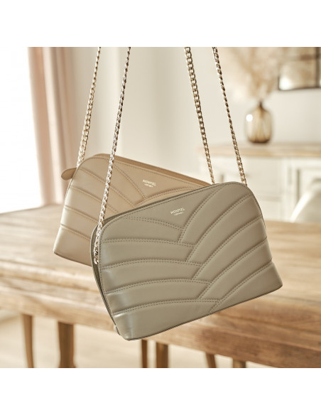 Quilted leather bag with gold chain in taupe and beige hanging - MONPIEL