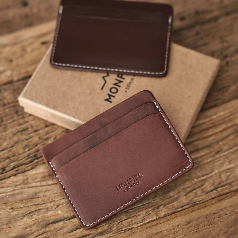Mini Havana and brown leather cardholder, resting on its box - MONPIEL