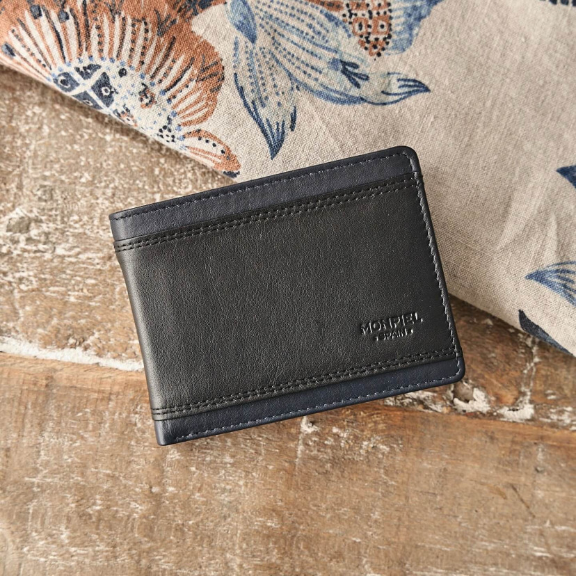 Black leather American wallet with coin purse and cardholder, shown from the front resting on a table - MONPIEL