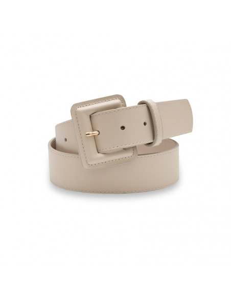 Wide women’s leather belt with covered buckle in beige, coiled on white background - MONPIEL Wide women’s leather belt with covered buckle in beige, coiled on white background - MONPIEL