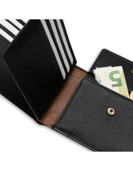 Cartera americana grande con monedero raya lateral de piel en color negro con detalle interior en primer plano sobre f - MONPIEL Cartera americana grande con monedero raya lateral de piel en color negro con detalle interior en primer plano sobre f - MONPIEL