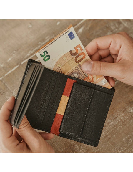 Leather wallet with coin pocket, featuring Spanish flag, in black color, open, holding a bill - MONPIEL Leather wallet with coin pocket, featuring Spanish flag, in black color, open, holding a bill - MONPIEL