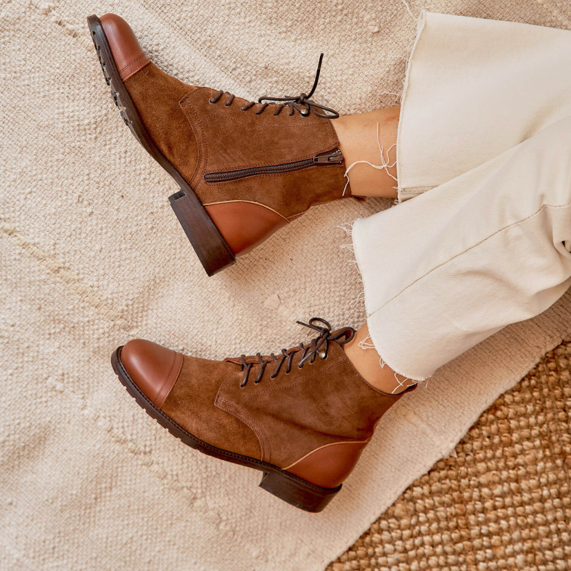 Women’s leather lace-up ankle boots in tan color, side view on a rug - MONPIEL