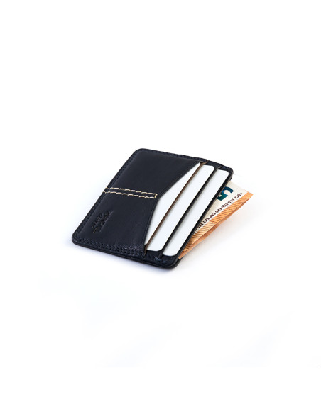 Western leather cardholder in navy color, angled view, on a white background - MONPIEL Western leather cardholder in navy color, angled view, on a white background - MONPIEL