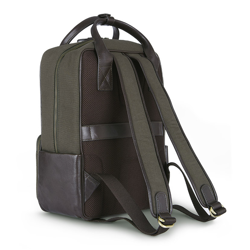 Sport canvas and leather backpack in green color, angled back view, on a white background - MONPIEL