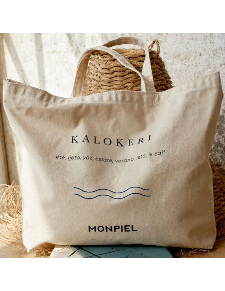Borsa Kalokeri in cotone di colore avorio, vista frontale, appoggiata - MONPIEL Borsa Kalokeri in cotone di colore avorio, vista frontale, appoggiata - MONPIEL