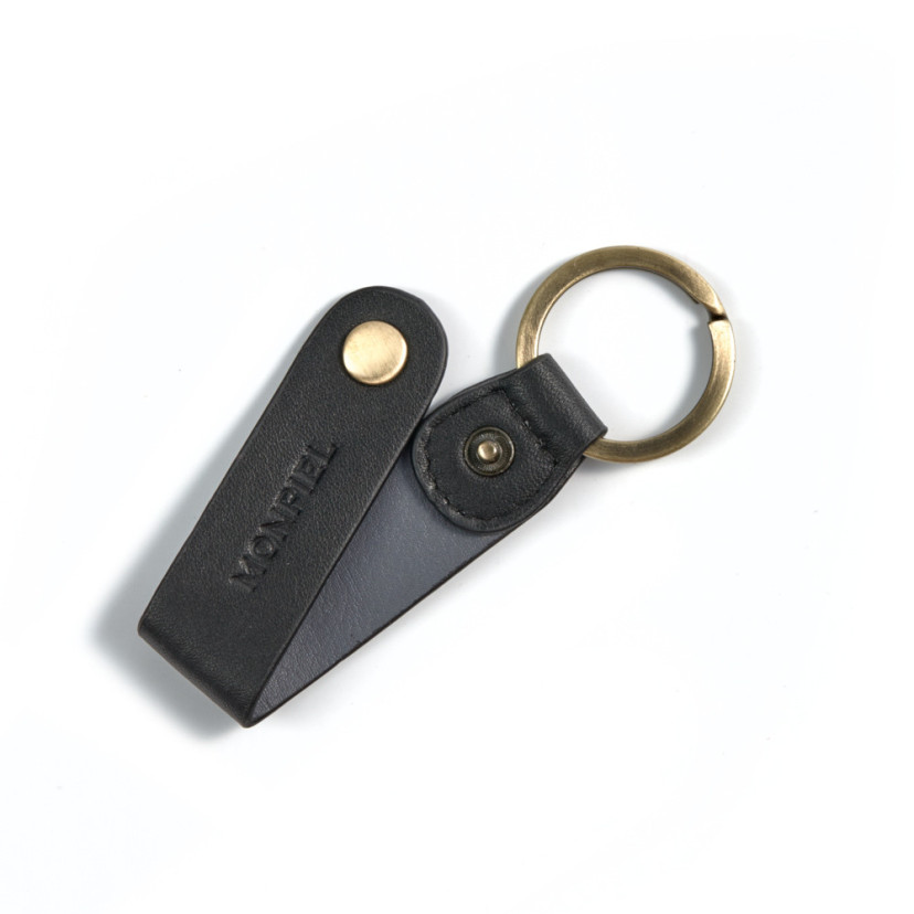 Black leather keychain, open, slightly tilted on a white background - MONPIEL
