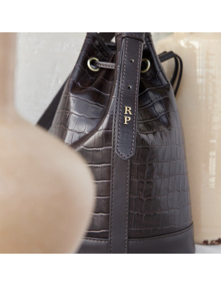 Large crocodile-patterned leather bucket bag in brown color, featuring personalization detail - MONPIEL
