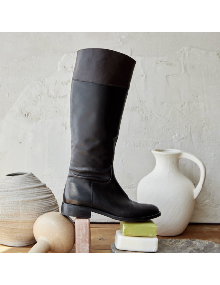 Tall leather jumping boot, side view, resting on soaps - MONPIEL