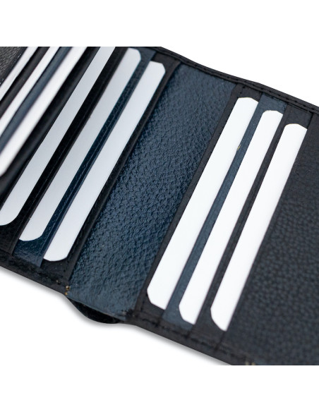 Black leather wallet with elastic band and card slots, close-up view - MONPIEL