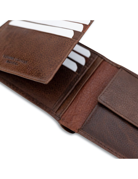 Brown leather bi-fold wallet with coin pocket and elastic band, open, showing card slots, on a white background - MONPIEL Brown leather bi-fold wallet with coin pocket and elastic band, open, showing card slots, on a white background - MONPIEL