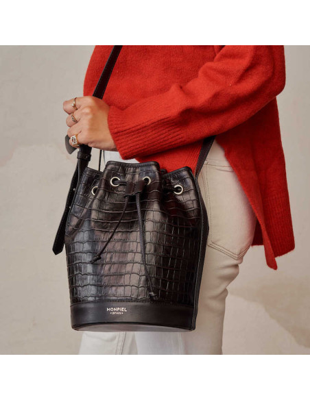 Large brown crocodile leather bucket bag, front view, hung over the shoulder - MONPIEL