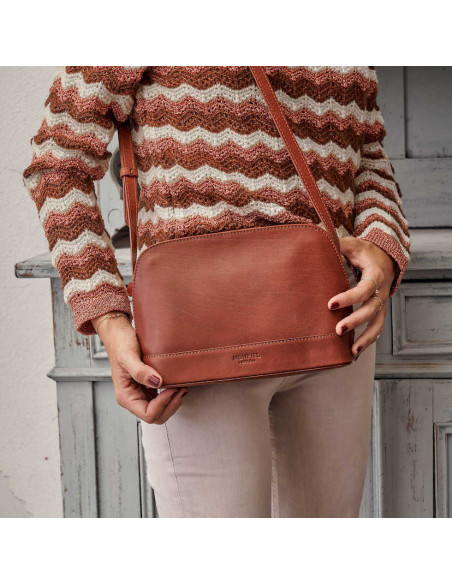 Medium tan leather bag, front view, hung over the shoulder - MONPIEL