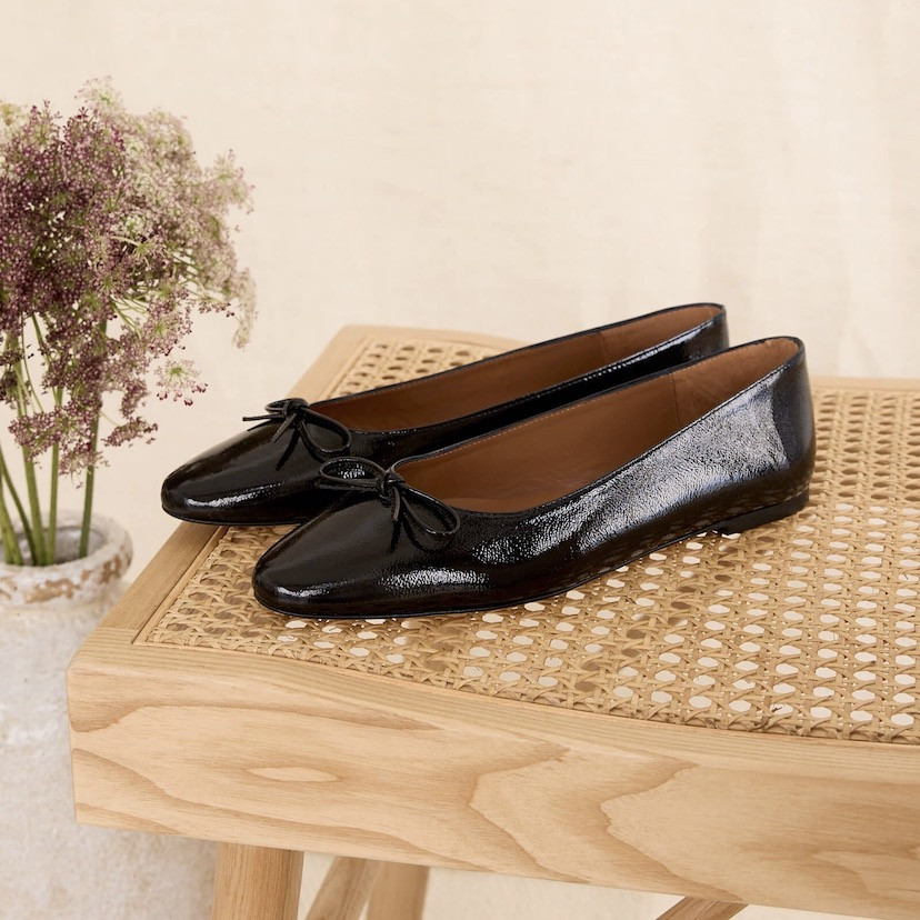 Blue patent leather Manolita pointed toe ballerina, perspective view, resting on a bench - MONPIEL