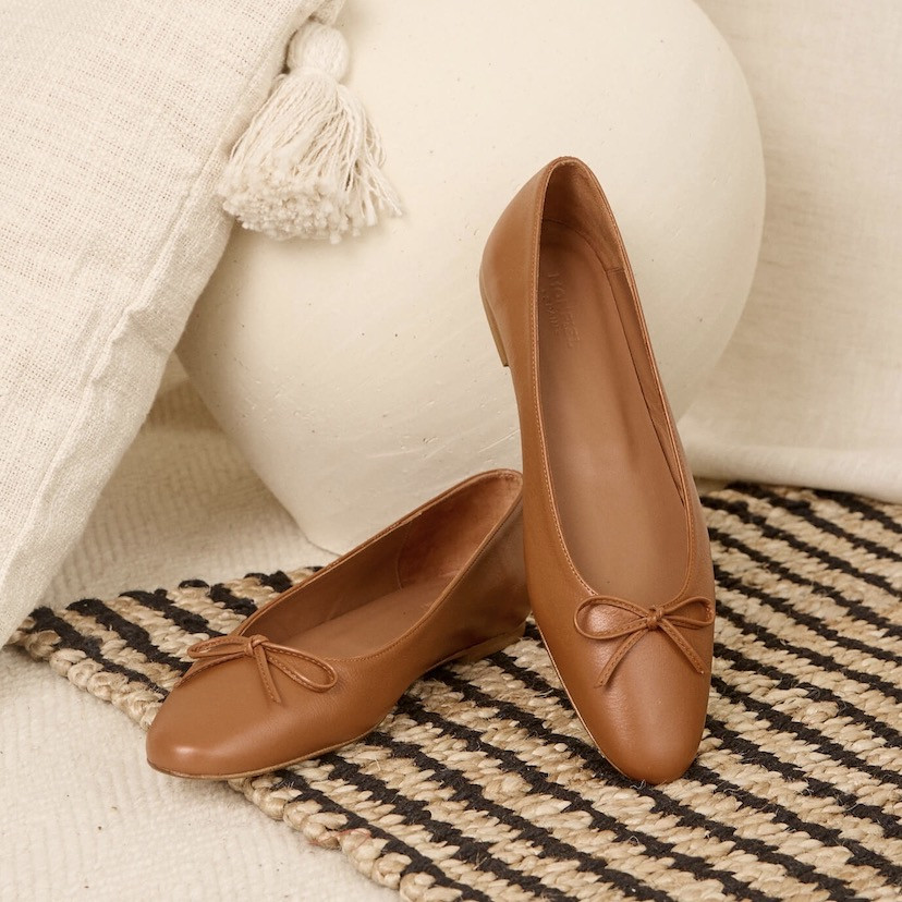Leather Manolita pointed toe ballerina, perspective view, resting on a vase - MONPIEL